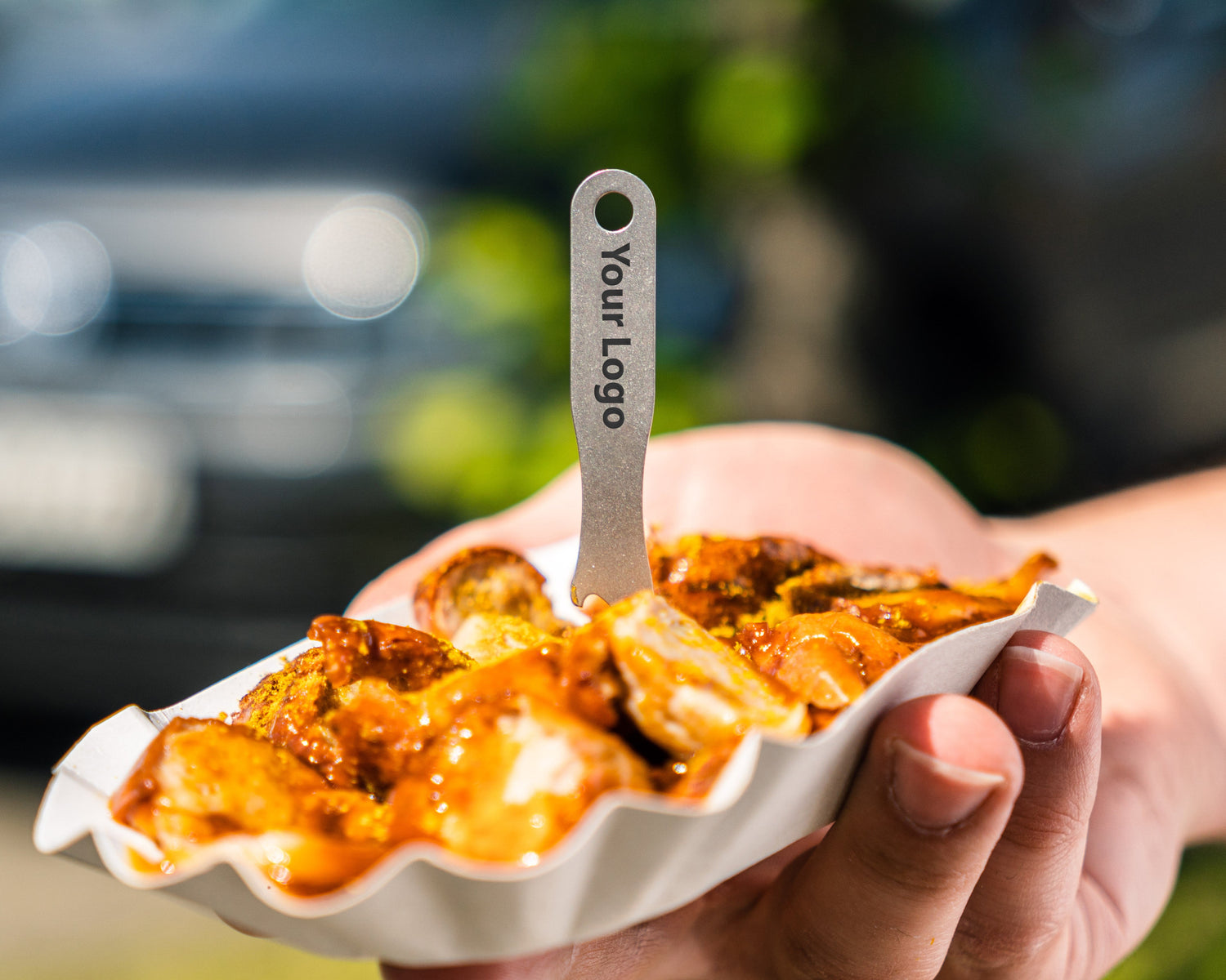 Pommesgabel mit Currywurst